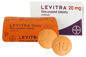 Bild einer Levitra Original Packung und zwei Tabletten